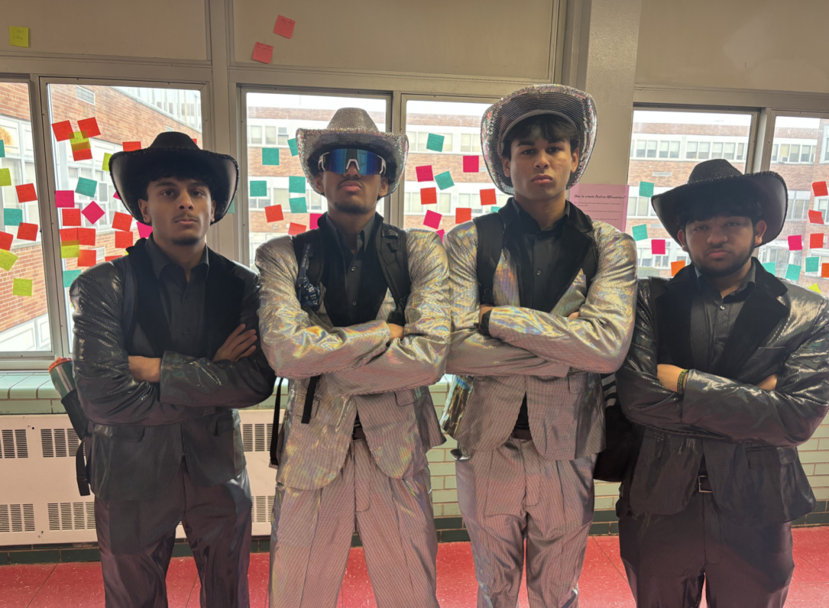 Seniors Kanav Dani, Arav Singh, Vansh Patel and Jensen Varghese coordinate a disco cowboy group costume.